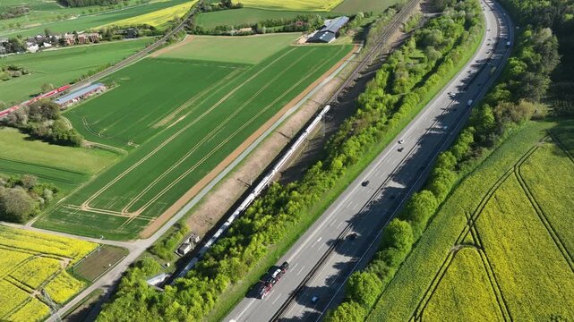 Idstein, Germany - April 23, 2026: Aerial view of German highway A3 and high speed train track between Bad Camberg and Idstein. 