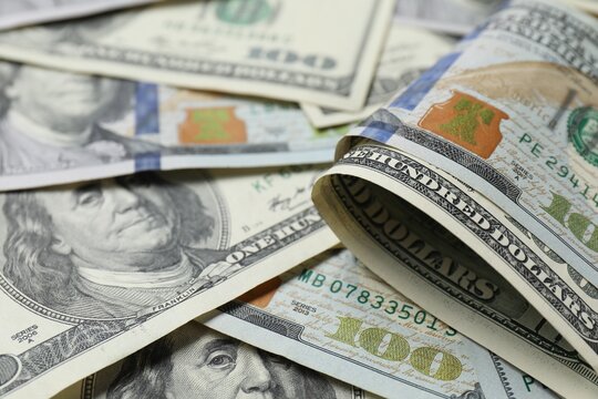 Old and new hundred dollar bills, closeup