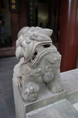 Fototapeta premium Chinese guardian lion sculpture (male) at Chengdu Wu Hou Shrine, Sichuan Province of China