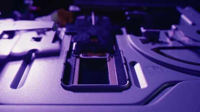 Floppy disc FDD close up, Using diskette for old PC computer macro. Archive programme or Music recorder, playing retro computer games. Vintage device for office, obsolete technology. 