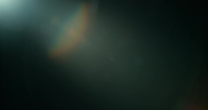 Slow motion cinematic lens flare and light leak effect isolated on black background. Perfect overlay for VFX, transitions, title reveals, film burn style and glow highlights.
