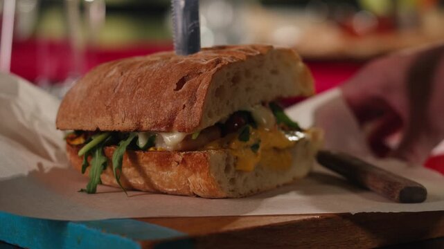 Fish sandwich foccacia with prawns, delicious homemade spicy shrimp sandwich with lettuce, tomato, and tartar sauce.