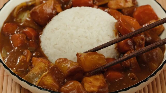 Japanese curry rice with fry pork Tonkatsu, Katsu Kare, Japanese breaded cooking dinner in restaurant, close up macro of asian food. 