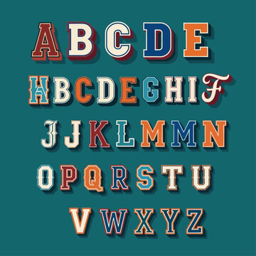 The alphabet is displayed in various colorful fonts on a green background.