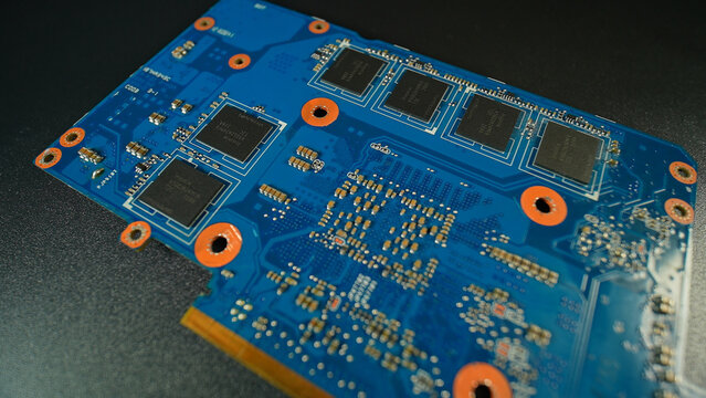 NVIDIA GPU back side card designed with black chips semiconductors integrated circuits ICs, with GDDR VRAM various power management and interface controllers: Toronto, Ontario, Canada - March 24, 2026