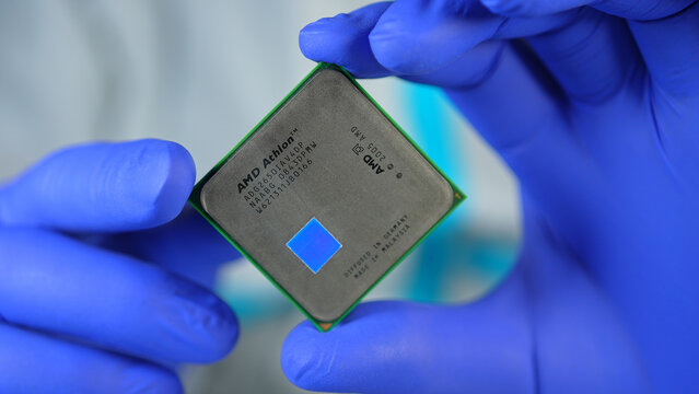 AMD CPU Central Processing Unit of the computer in the hand of engineer. Concept of AI boom triggered shortage of CPUs, components for data centers: Toronto, Ontario, Canada - March 24, 2026