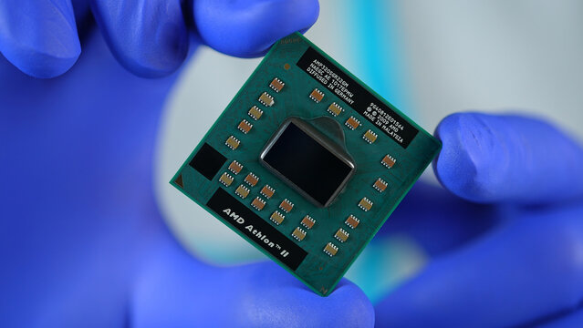 AMD CPU Central Processing Unit of the computer in the hand of engineer. Concept of AI boom triggered shortage of CPUs, components for data centers: Toronto, Ontario, Canada - March 24, 2026