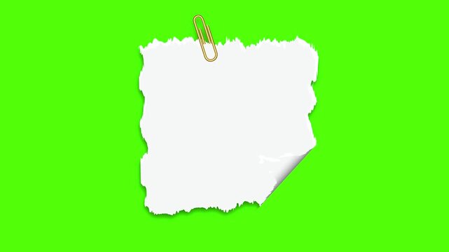 Torn Paper Note with Clip on Green: A blank, torn paper note with a paper clip, placed against a vibrant green backdrop, representing space for a concept.
