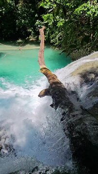 Waterfall with turquoise water in Luwuk, Central Sulawesi
