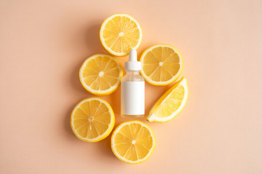 Dropper bottle with citrus serum surrounded by fresh lemon slices for natural