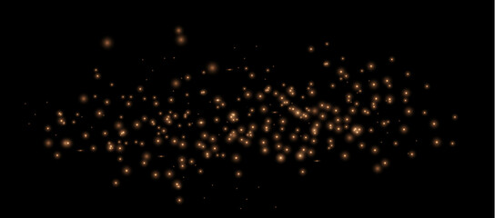 Golden sparkling dust particles with bokeh effect and glowing magic glitter on black backgroun © LILIIA SMIRNOVA