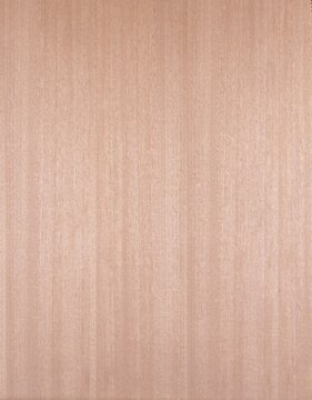 Khaya African mahogany veneer with soft pinkish-brown tones and fine straight ribbon grain, refined hardwood surface.