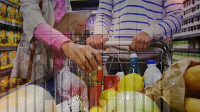 Woman checking tablet reaching into market cart while partner steering, data overlay tagging items