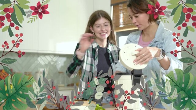 Mom and daughter prepping food at kitchen, right placing processor lid, then mixing, floral border