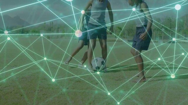 Three kids dribbling soccer ball after initial kick, teal network overlaying movement for sports