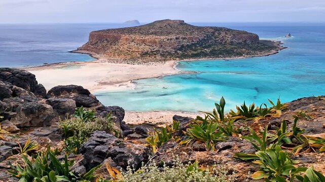 Balos Bay Crete Greece 4k static footage of turquoise lagoon and Gramvousa island. Breathtaking Mediterranean sea landscape with rocky coast and exotic beach. Iconic Greek travel destination scenery