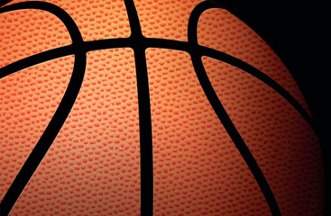 Obraz premium Orange basketball against a dark background