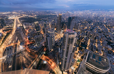 Naklejka premium Tel Aviv Night Aerial View Glowing Urban Highway Network