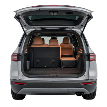 Silver SUV with open trunk and brown leather seats inside transparent background