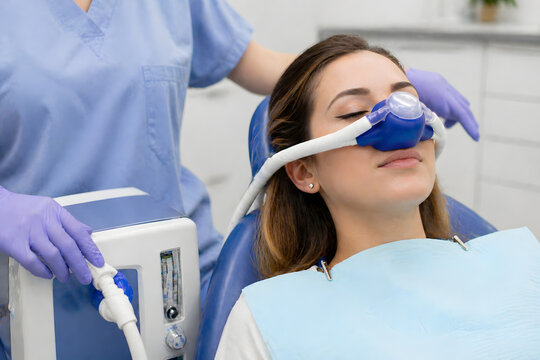 Dental Nitrous Oxide Sedation &ndash; Patient Receiving Laughing Gas for Anxiety-Free Dental Treatment