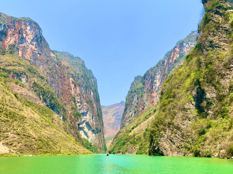 Ha Giang, Vietnam - March 09, 2020: Stunning Turquoise Nho Que River Winding Through the Dramatic Tu San Canyon Amid Lush Green Hills on the Ha Giang Loop