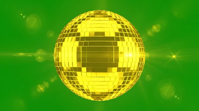 Golden Disco Ball Reflecting Light on Green Background with Lens Flares.