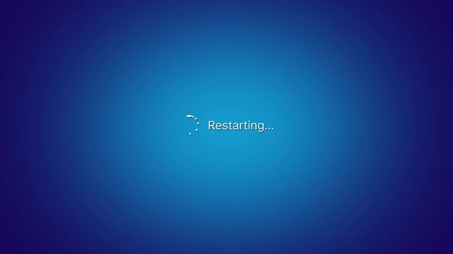 Restarting screen on windows animation on blue background. Shutting down notification computer screen. 4K Infinite Loop.