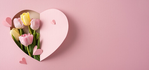 Naklejka premium Pink tulip bouquet in heart-shaped paper cutout for Happy Mother's Day greeting and gift
