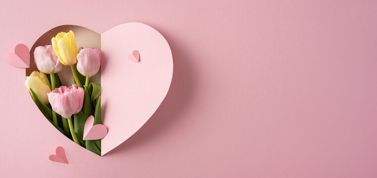 Pink tulip bouquet in heart-shaped paper cutout for Happy Mother's Day greeting and gift