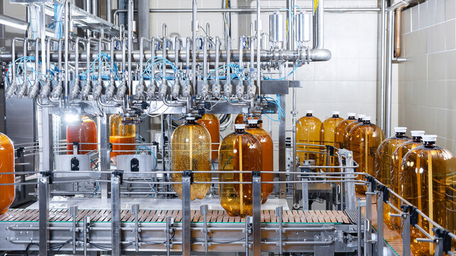 Automated beer bottling process in a modern brewery facility
