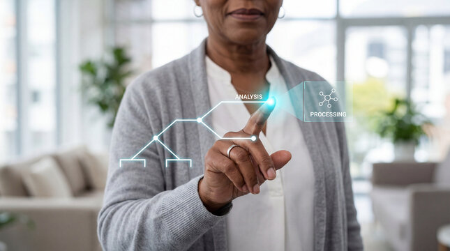 Senior woman using futuristic holographic AI analysis interface with decision tree processing in home setting