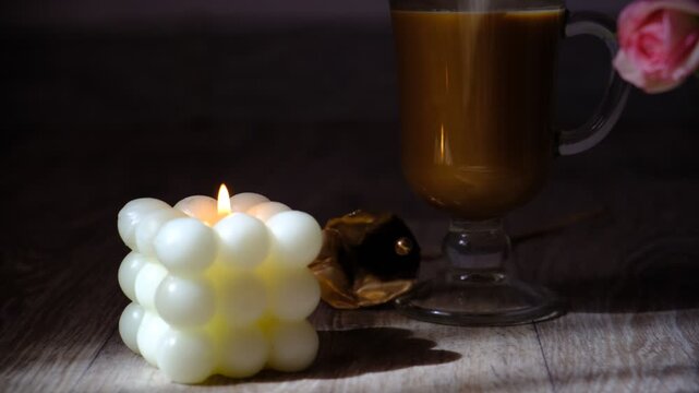 Soft hush of twilight in the room. Single candle burns steadily, The atmosphere is serene and romantic, quiet reflection, a heartfelt conversation, or simply enjoying the warmth of solitude.