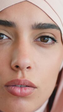 Sad stressed Arabian Muslim woman in hijab talking at camera indoors worried upset female Islamic girl portrait online video call conference virtual communication businesswoman interview indoor home