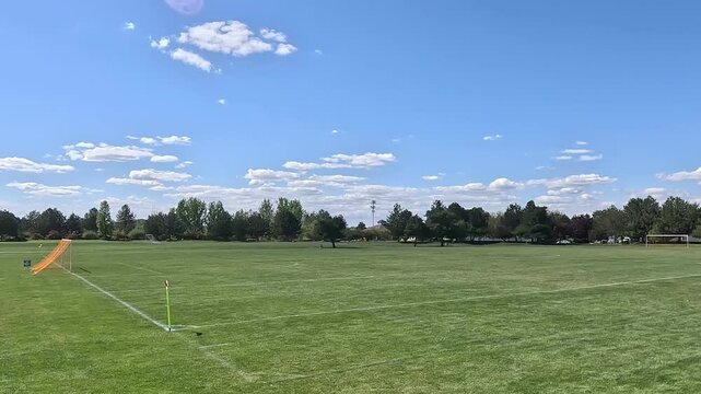 Wide View of Soccer Field with Small Corner Flag Waving