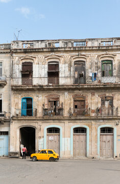 Cuba, Cienfuegos.  The facade of an old commercial/residential building.