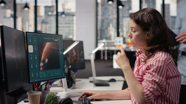 Two colleagues waiting for AI text to video generating on computer, futuristic visuals of Mars and outer space. Artificial intelligence used to create cosmic materials of the spatial universe.