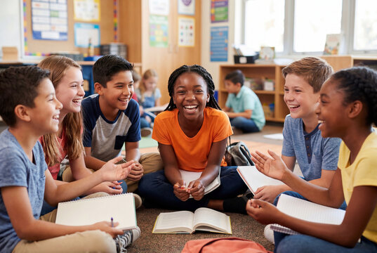 Diverse middle school students sitting in a circle learning together