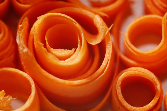Macro texture of sliced carrot. Daucus Carota are a good source of several vitamins and minerals, especially biotin, potassium, and vitamins A from beta carotene, K1 phylloquinone and B6