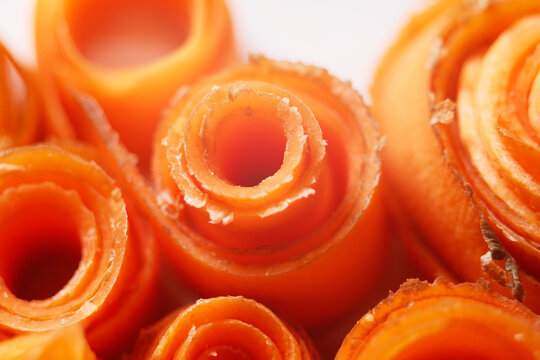 Macro texture of sliced carrot. Daucus Carota are a good source of several vitamins and minerals, especially biotin, potassium, and vitamins A from beta carotene, K1 phylloquinone and B6