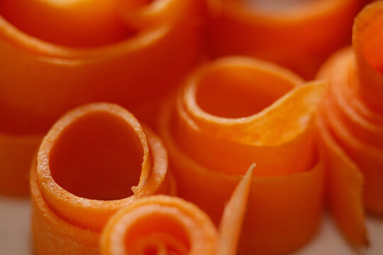 Macro texture of sliced carrot. Daucus Carota are a good source of several vitamins and minerals, especially biotin, potassium, and vitamins A from beta carotene, K1 phylloquinone and B6