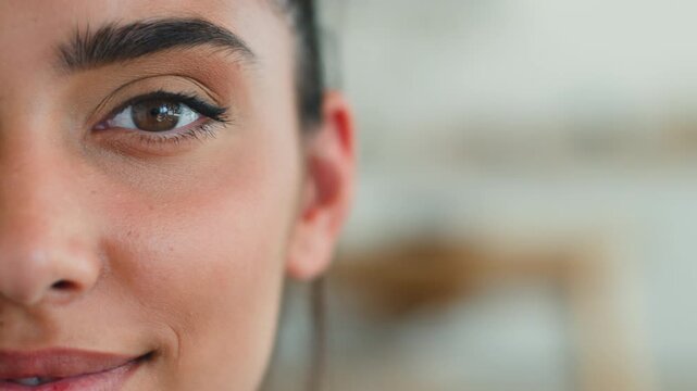 Half face portrait Indian woman smiling looking at camera indoors beauty skincare female Arabian Hispanic girl smile close up feminine lady cosmetology plastic surgery procedure health care medicine