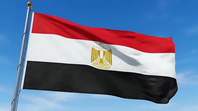 Egyptian Flag Waving Proudly Against a Clear Blue Sky.