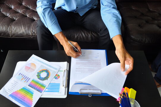 Accountant women hands pointing excel stat financial spreadsheet business graph charts make summary report. Excel graph with Spreadsheet Document showing Information Financial Startup Concept. Man