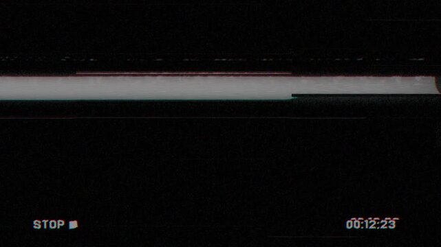 Stop VHS glitch screen with corrupted signal, scanline flicker and dust overlay on black background, high-quality 4K footage.