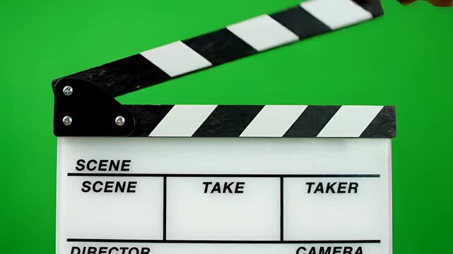 Filmmaking Clapperboard Ready for Action on Green Screen Background.