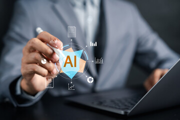 Obraz premium Businessman pointing at artificial intelligence hologram dashboard. Data analysis, machine learning and digital transformation business concept.