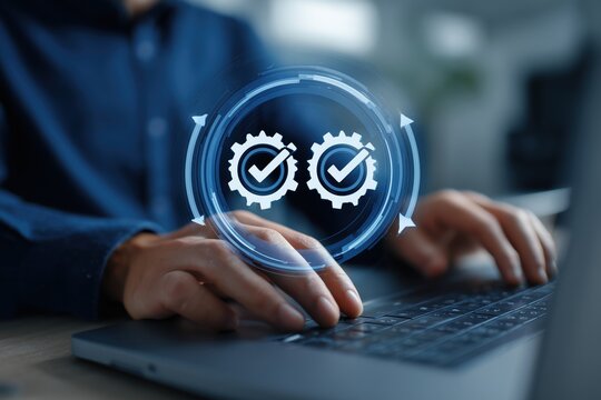 a tight shot shows a person's hands on a laptop keyboard prominent blue digital overlay of two gears, each with checkmark, surrounded by a circular arrow, symbolizing process automation Generative AI