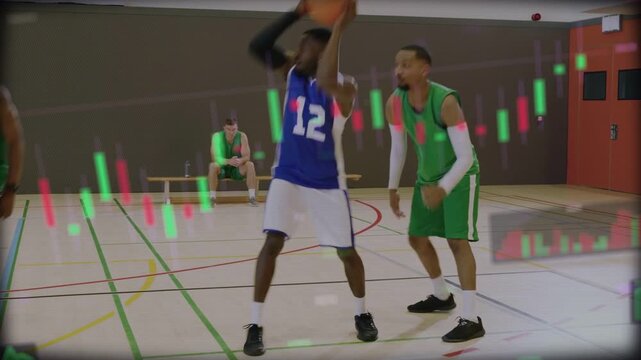 Green defender shuffling to stop blue guard driving after crossover, stock candles covering players