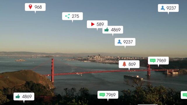 Badge icons spawning at sunrise, rising, clustering over red bridge, then clearing, showing buzz