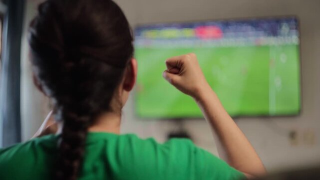 Excited Mexican woman watching a soccer match, celebrating a goal, getting disappointed by the loss, and expressing frustration with her favorite team's failure at home